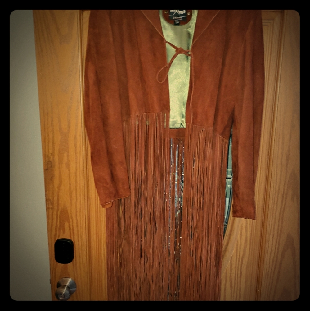 Suede fringed jacket and Cowboy hat